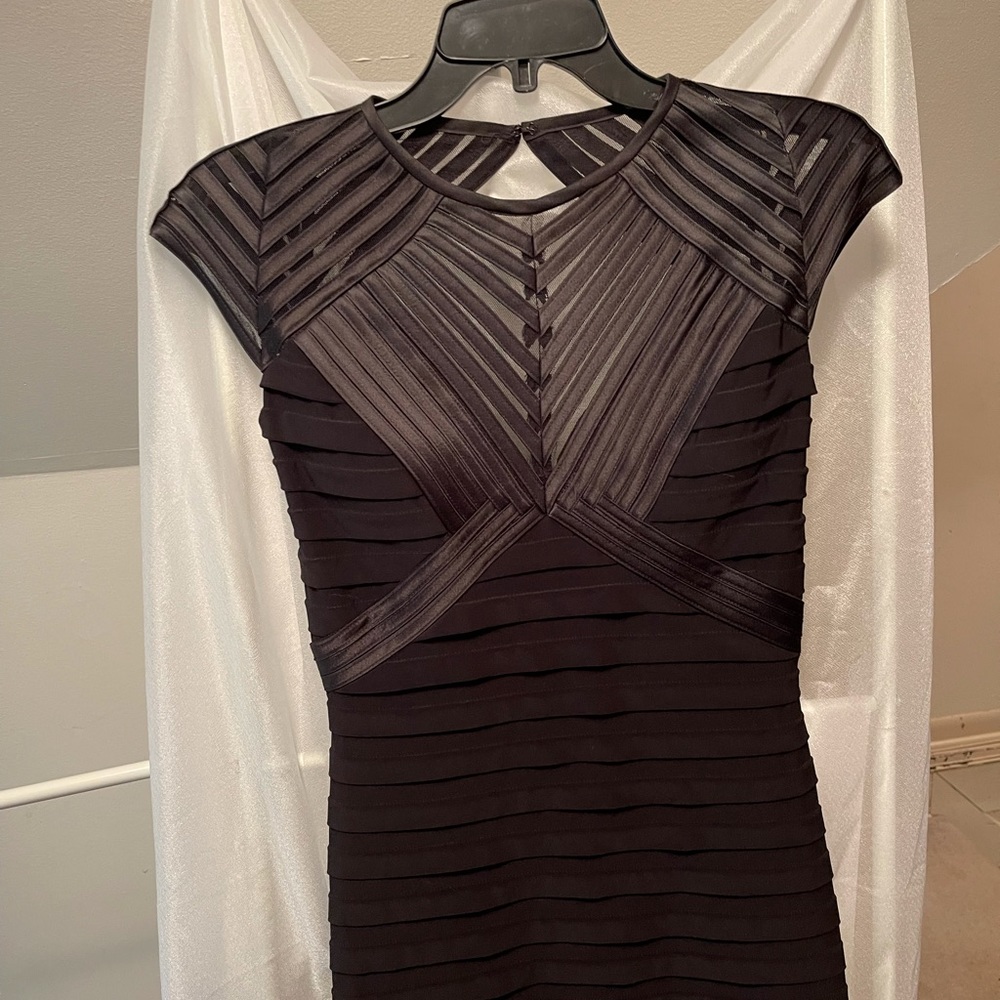 Long black fit to flare evening gown